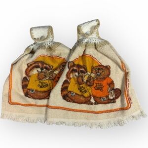 Hallmark Shirt Tales Tan and Orange Kitchen Towels Beaver and Raccoon Design